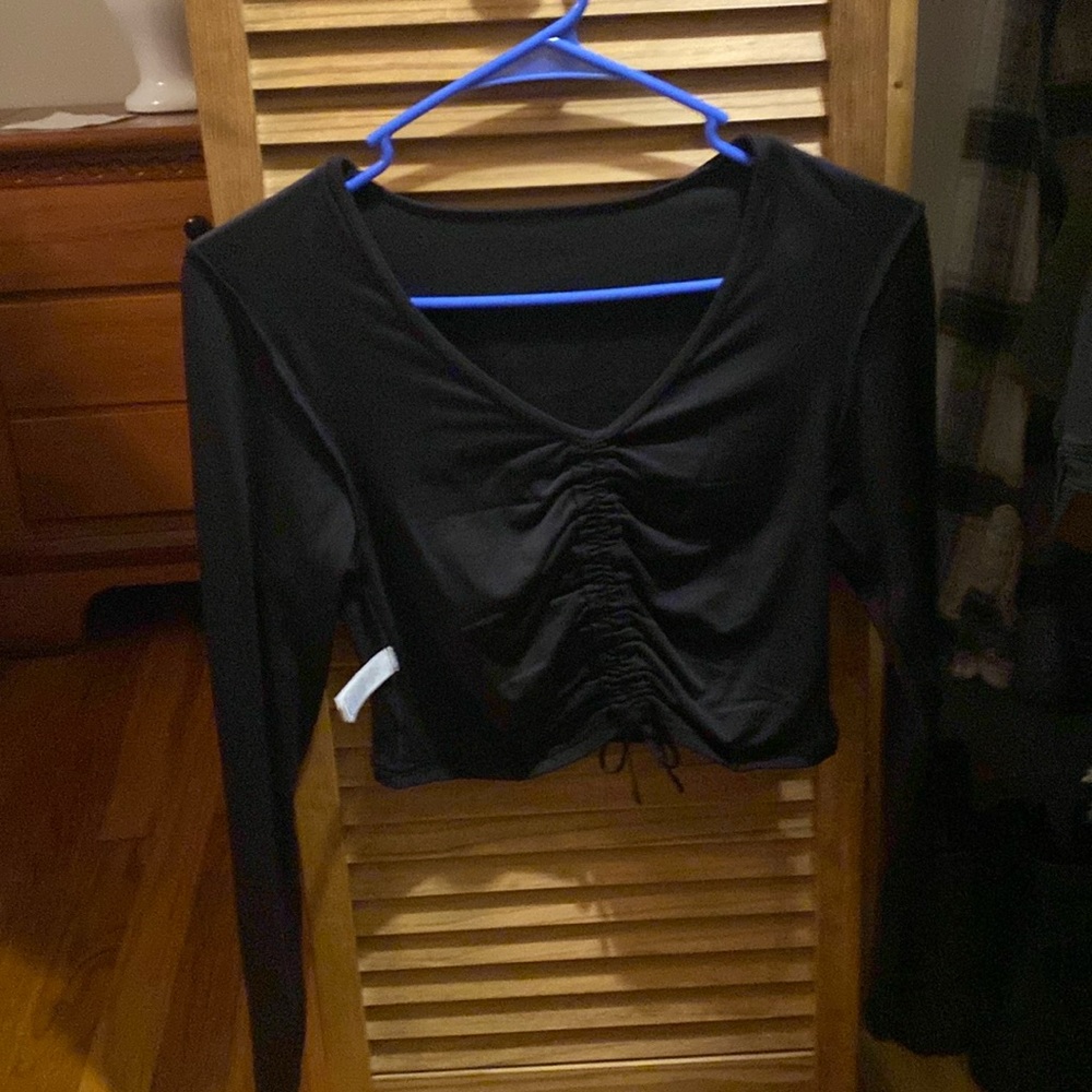 Black workout top, never been worn, tags on!